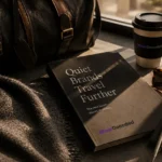 Luxury editorial travel flat lay featuring a leather duffel bag, sunglasses, coffee cup, India passport, and WearDecoded branded book with warm cinematic lighting.
